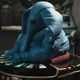 Max Rebo, the small blue Ortolan from Jabba's palace band, plays his organ in his current position at Garsa Fwip's Sanctuary.